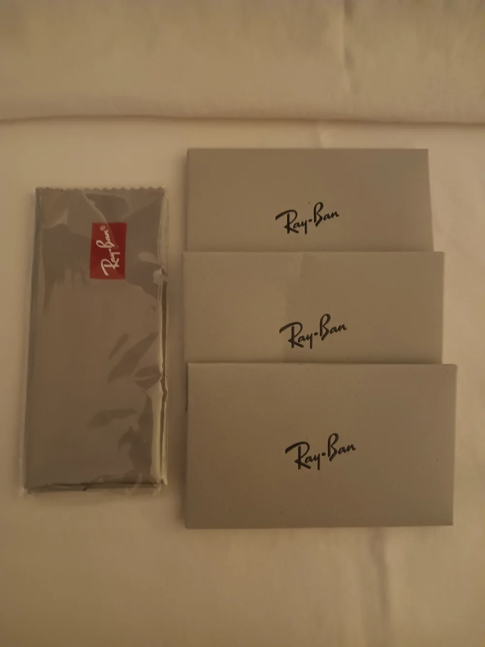 Ray-Ban Gray Cleaning Cloth and Three Gray Card Sleeves